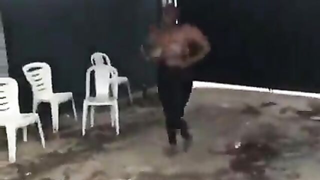 Alleged mad woman strips naked, showing breasts in public while dancing - 3 image