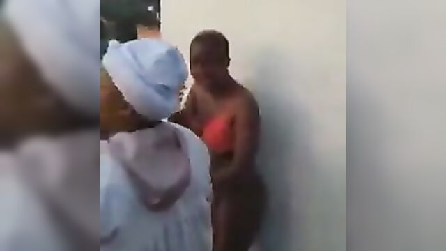 Real pastor strips lady naked & flogs her for cheating - 1 image