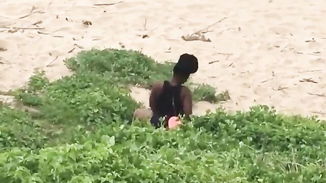 Couple caught discreetly having sex in the bush by the beach side - 3 image
