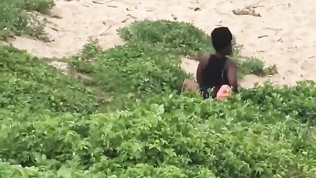 Couple caught discreetly having sex in the bush by the beach side - 5 image