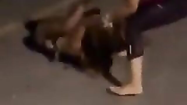 Pussy exposed as married woman beats sidechick in public after dragging her out of her cheating husband’s car