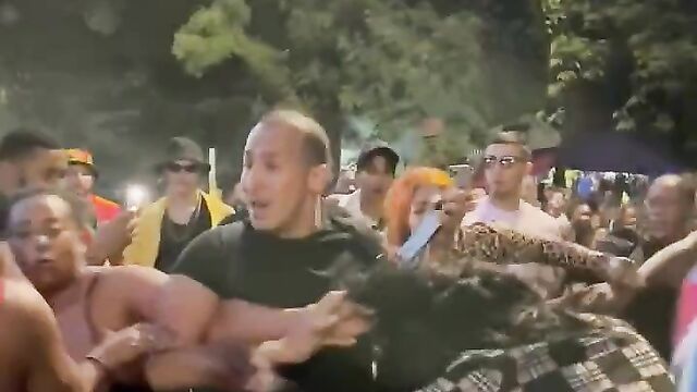 Breasts pop out as woman beats up her husband’s side chick in public at a festival