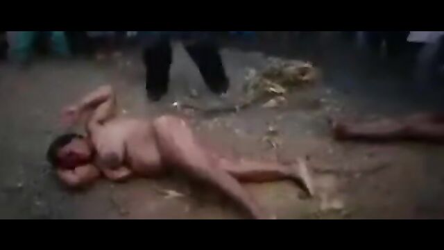 Women stripped naked & flogged in public for allegedly cheating - 1 image