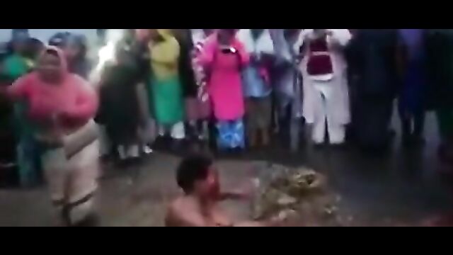 Women stripped naked & flogged in public for allegedly cheating - 3 image