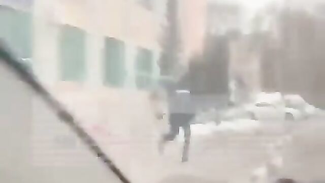 Naked woman caught running after police officer in Moscow, Russia - 1 image