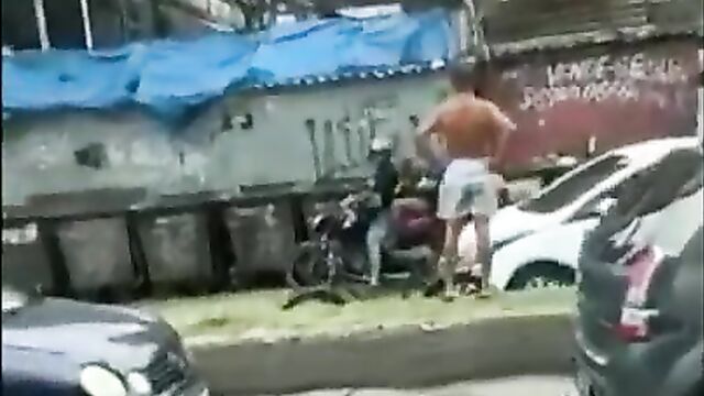 Breasts & nipples pop out in mad girl fight in public - 1 image