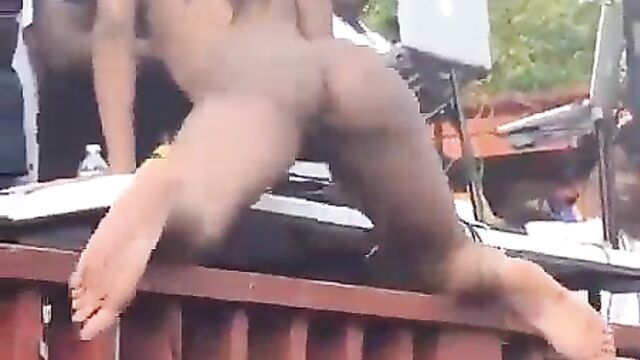 Chick twerking NAKED in public as people watch - 3 image