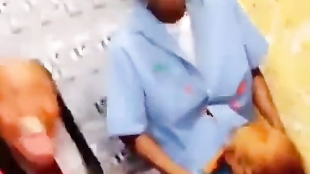 Nigerian girl giving blow job to boyfriend in public at a house party - 3 image