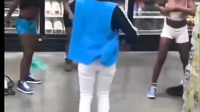 Boobs out in Walmart as girls fight in public