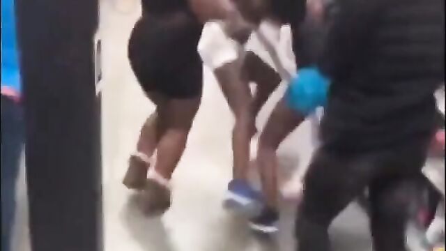 Boobs out in Walmart as girls fight in public - 3 image