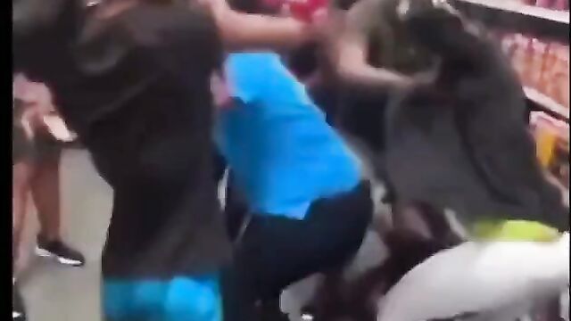Boobs out in Walmart as girls fight in public - 5 image