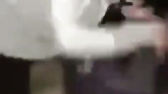 Boobs out as girl’s shirt comes off while her opponent pulls her by the hair over a window while fighting - 3 image