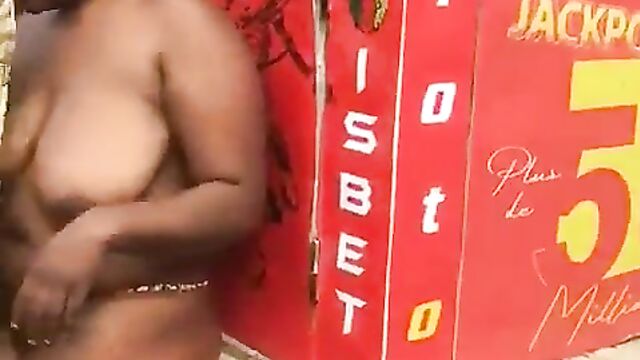Busty woman stripped naked in public and forced to eat money in Cameroon for allegedly stealing - 4 image