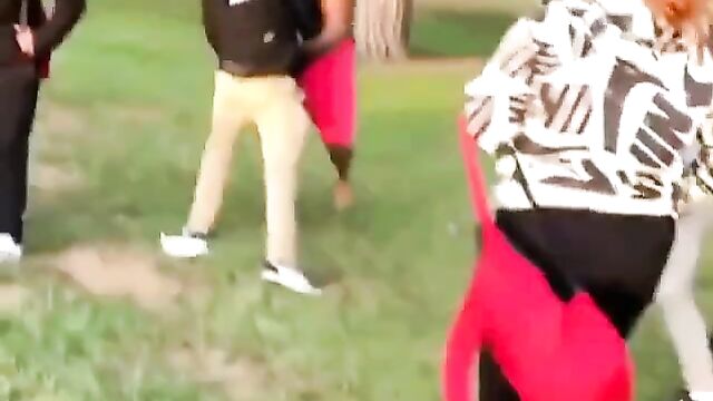 Big boobs fly out in public street fight - 4 image