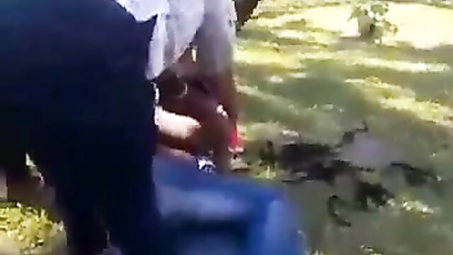 Wife beats and cuts off sidechick’s hair with scissors in public for sleeping with her cheating husband