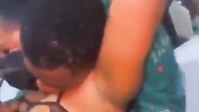 Dude squeezing a stripper’s boobs in public at a club party in Lagos - 3 image
