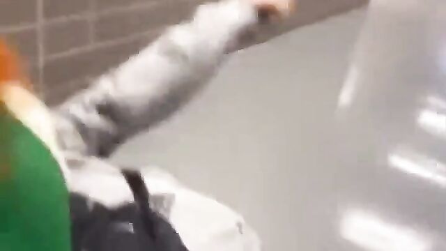 Lady’s boobs pop out while fighting - 1 image