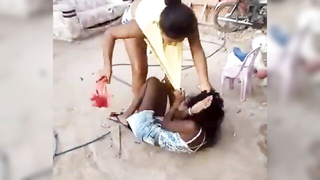 Ebony girl beats and strips sidechick in public - 1 image