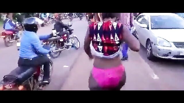 Boobs out as Nigerian girl with fine ass tries to walk naked in public for 800k - 1 image