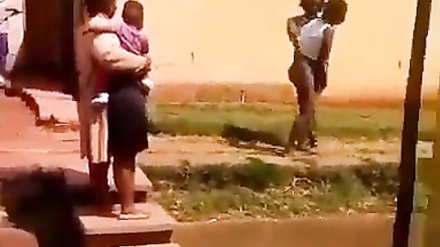 Wife caught sidechick pants down with her husband and beat her up in public - 3 image