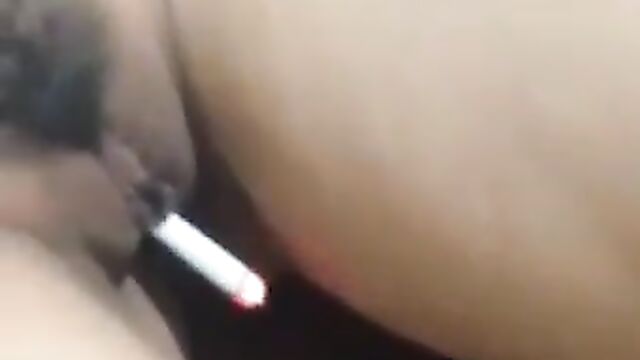 Woman smoking a cigarette with her pussy - 3 image