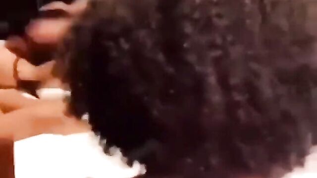 Boobs out as girl fights her friend for giving another woman oral sex - 1 image
