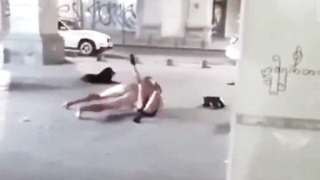 Drunk naked man and woman making out in public