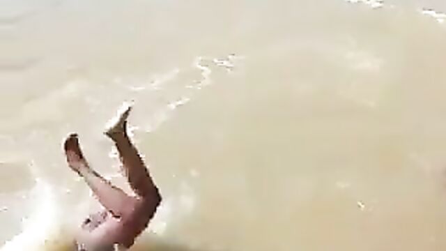 3 African ladies showing their breasts in a river - 5 image