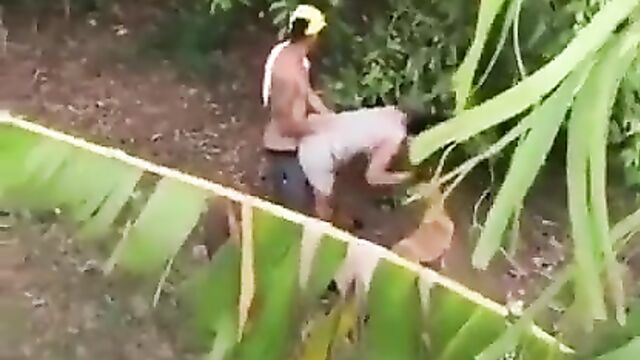 2 Students Caught Having Doggy Style Sex In Public In A Bushy Backyard - 5 image