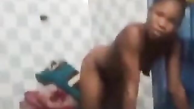 Naked ashawo with slippers breasts doing house chores for her customer - 3 image