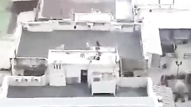 Naked couple caught bonking on a roof-deck in public - 1 image