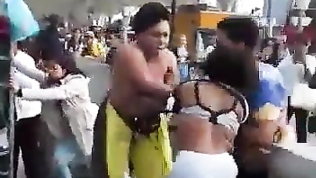 UK: Boobs out as women fight in Stratford, London - 4 image