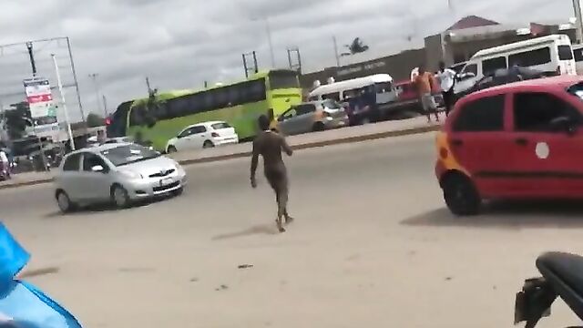 Alleged mad man caught naked in public in Lagos, Nigeria - 1 image