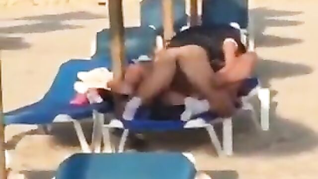 Horny couple caught having sex in a park in public - 1 image