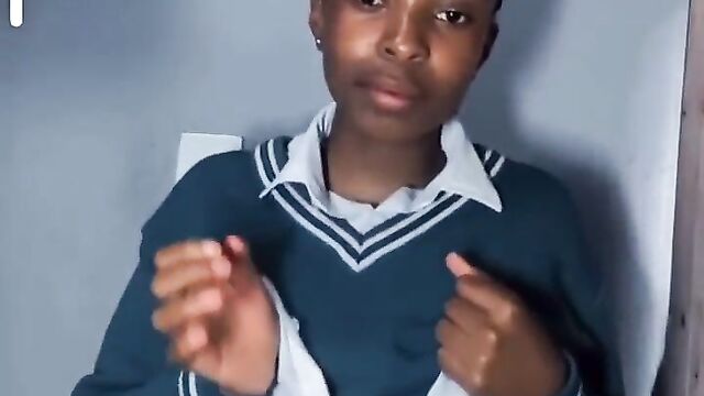 School girl caught flashing her boobs before school - 1 image