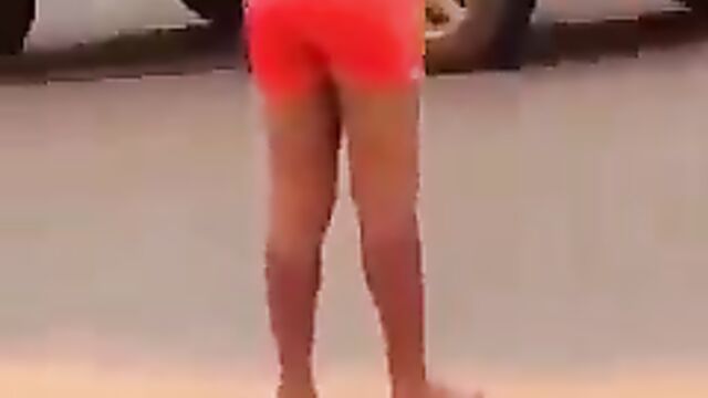 Lady strips and runs mad in Asaba, showing boobs in public - 5 image