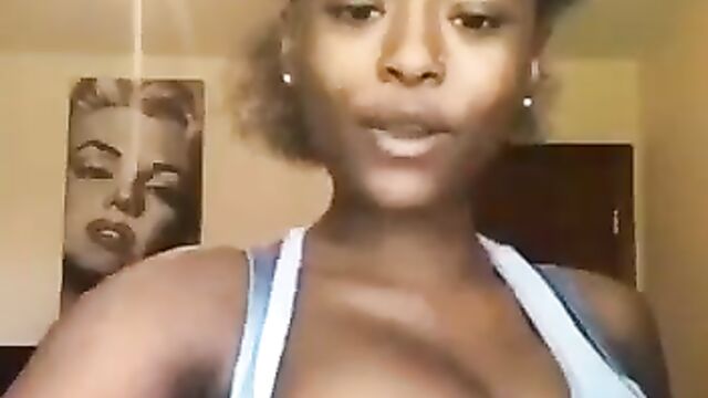 The Power of Boobs: Girl lifts a hanger with her nipple