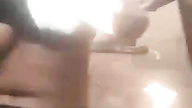 Mob strip busty lady naked in public for allegedly trying to rob a POS operator with a toy gun in Nigeria