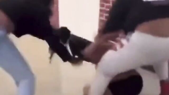 Boobs pop out as girls fight 2 vs 1 in public