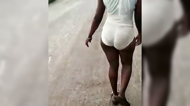 Ebony whore allegedly used for ritual runs mad and strips naked, showing boobs, ass and pussy in public - 4 image
