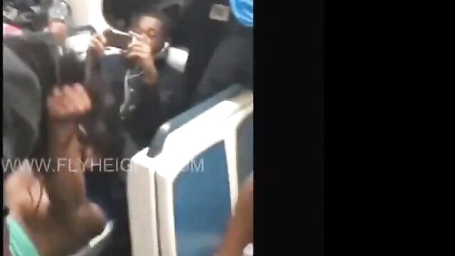 Woman fighting naked on a bus