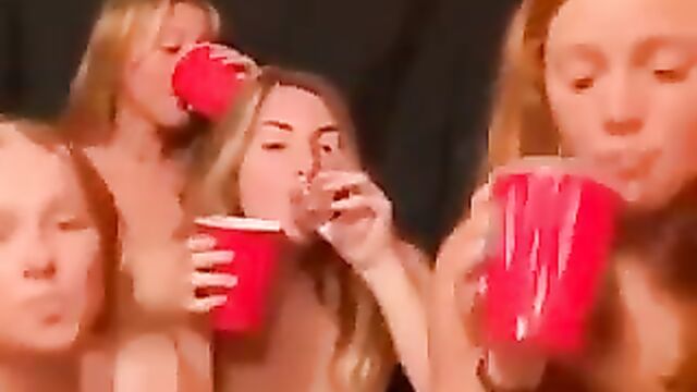 Naked white girls wilding after party, showing breasts - 1 image