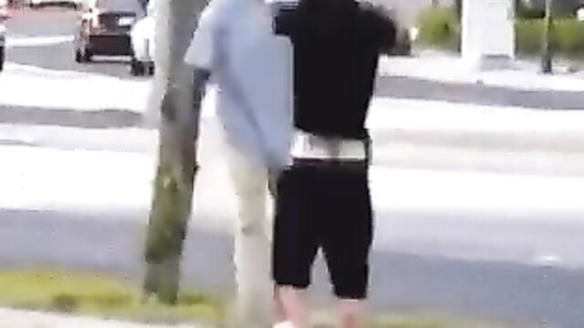 White dude strips naked in public to fight another man on the street - 3 image
