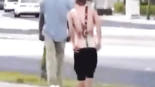 White dude strips naked in public to fight another man on the street - 5 image