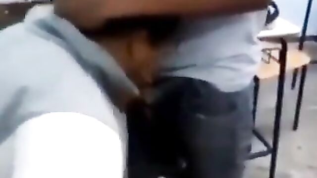 Schoolgirl caught giving two male students blow job in the classroom