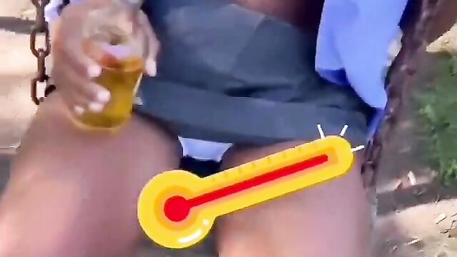 School girl swinging with breasts exposed in public