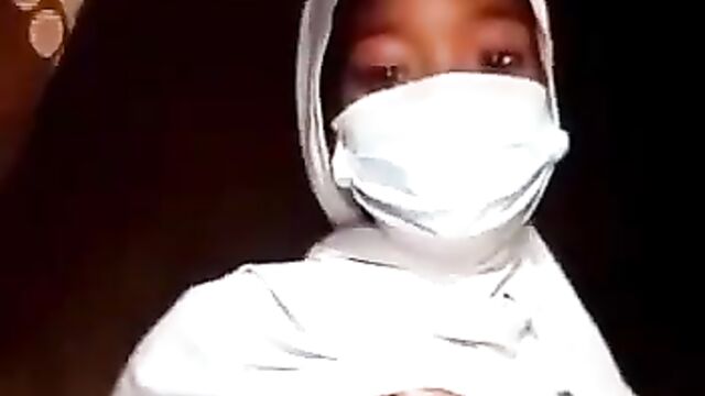 Muslim Girl Caught Showing Her Big Breasts To Her Boyfriend In Public - 1 image