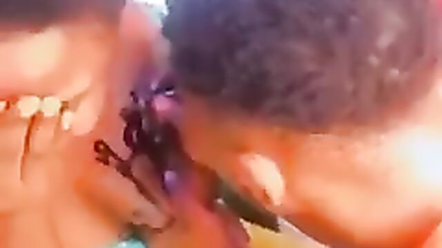 Nigerian Prostitute getting Breast Tattoo