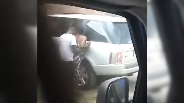 Black Couple Caught Having DoggyStyle Sex Beside Car In Public In Broad Daylight - 2 image