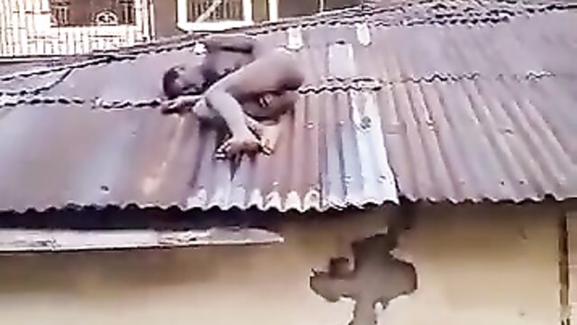 Naked Woman With Small Boobs Caught On Rooftop In Public In Benin City, Nigeria - 3 image